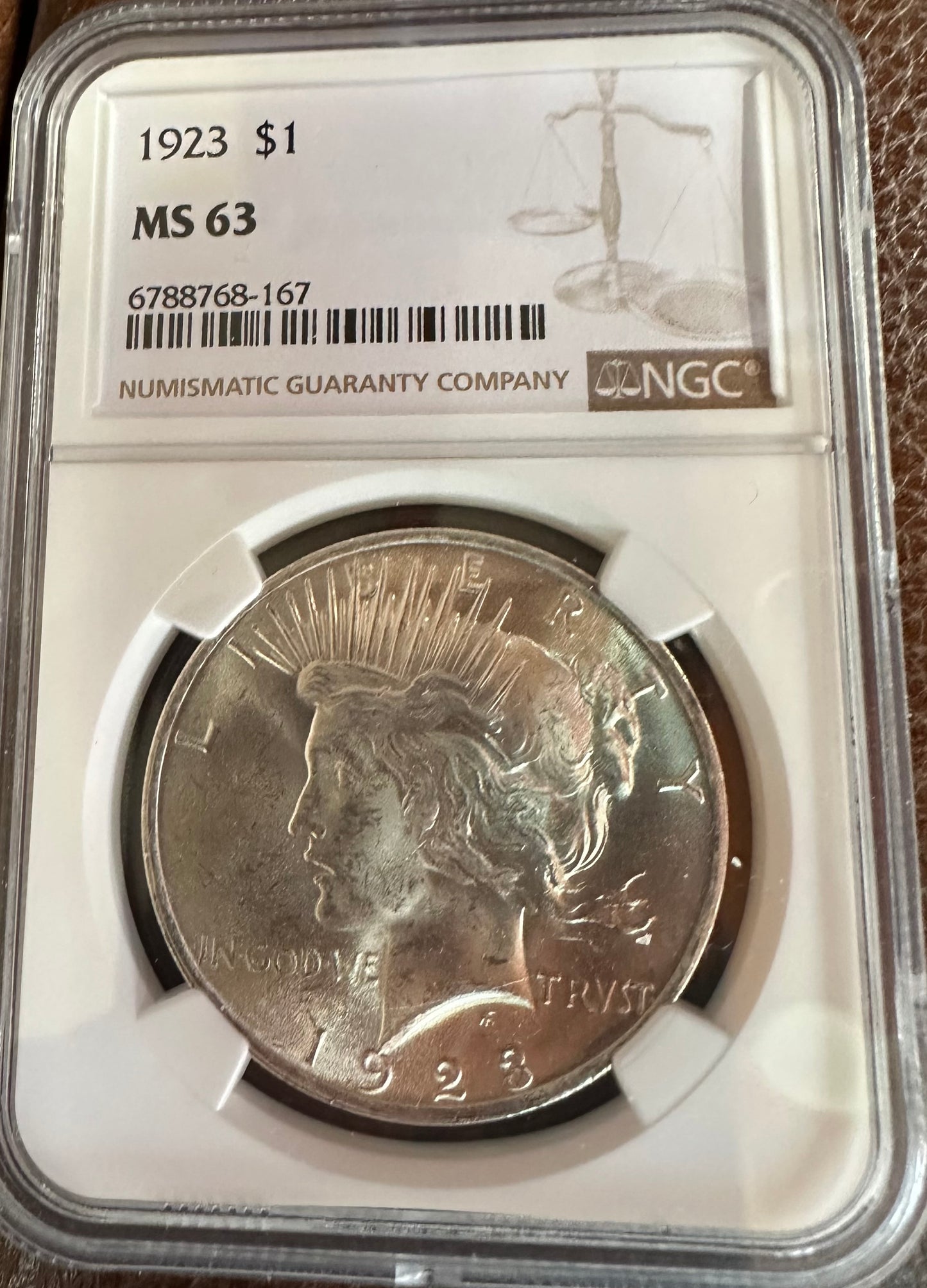 1923 Peace Dollar - NGC MS63 - Titan Treasure Trove