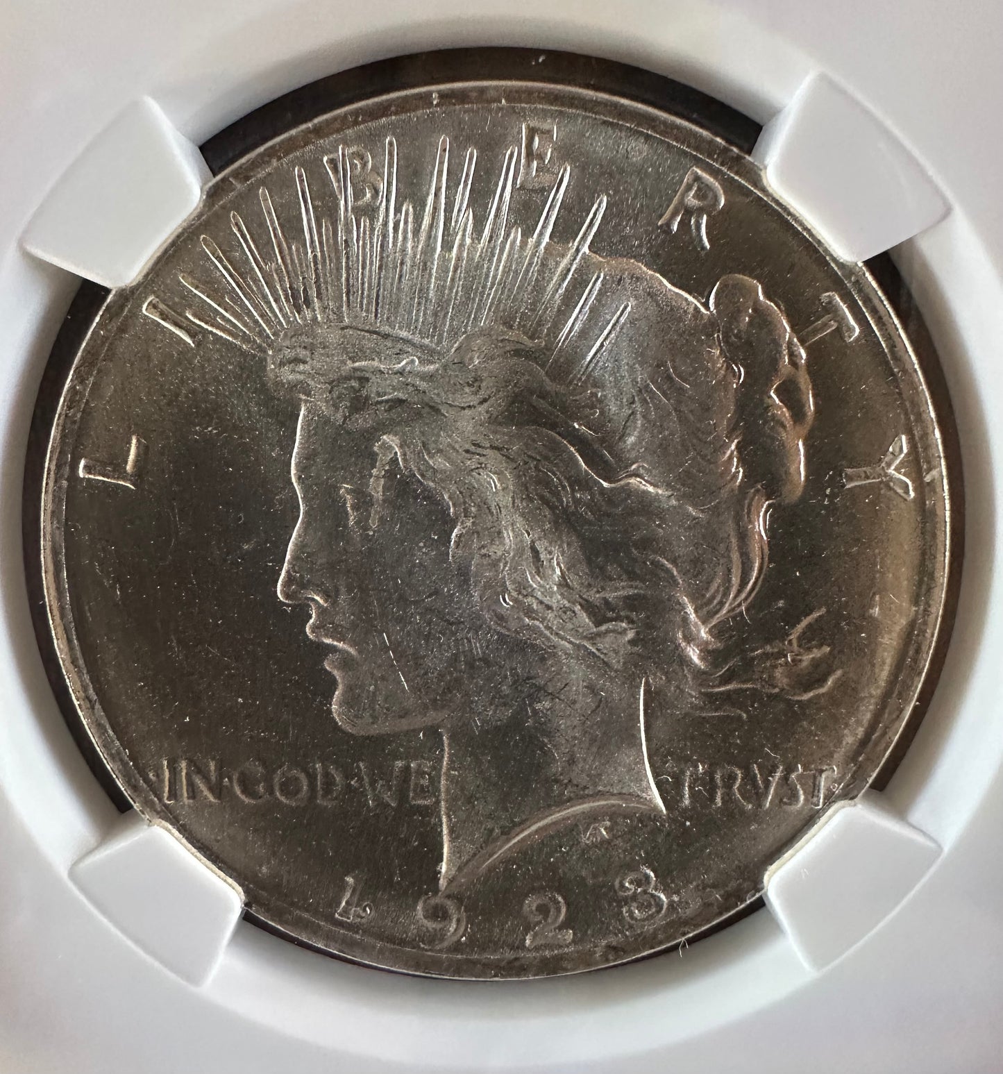 1923 Peace Dollar - NGC MS63 - Titan Treasure Trove