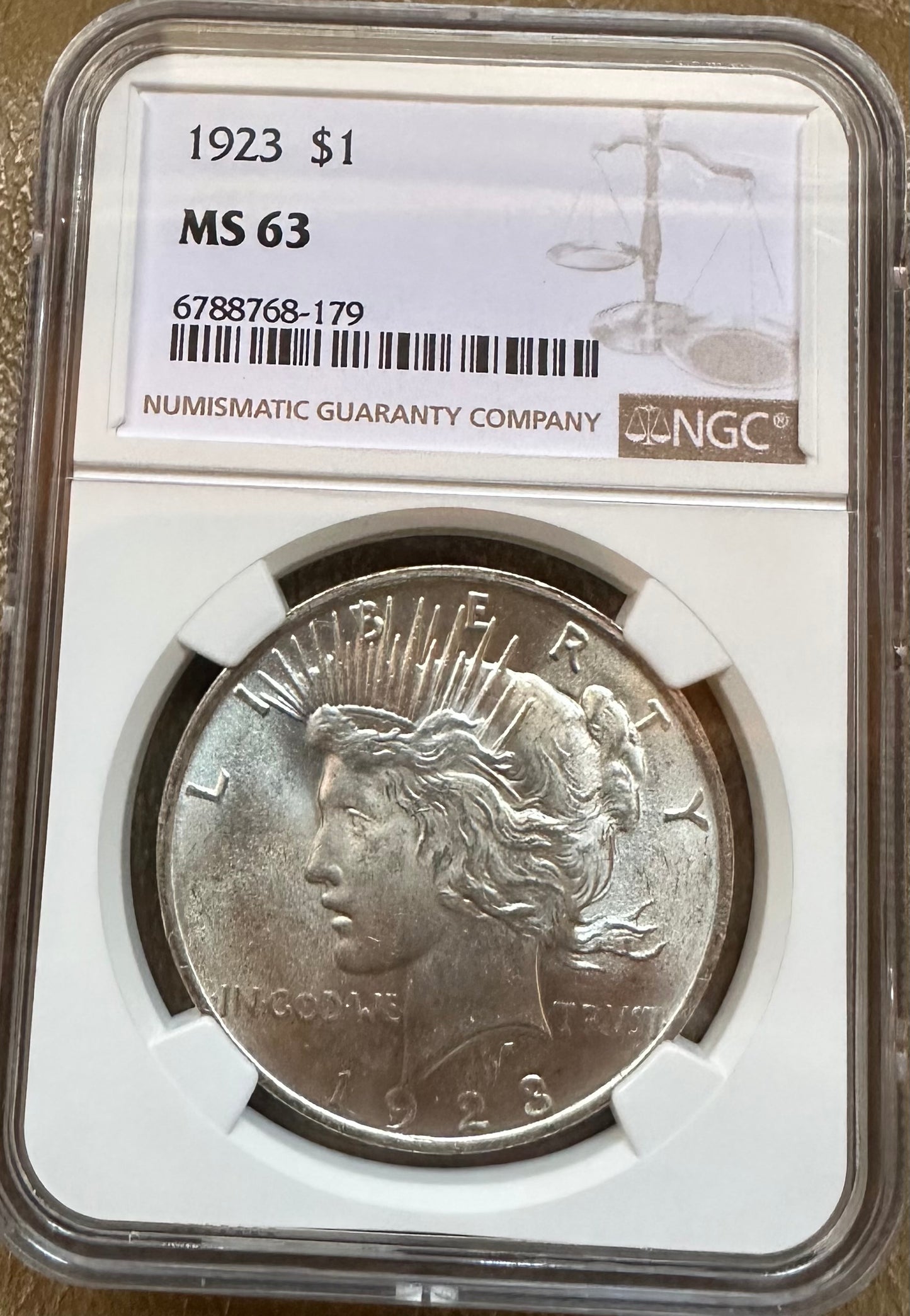 1923 Peace Dollar - NGC MS63 - Titan Treasure Trove